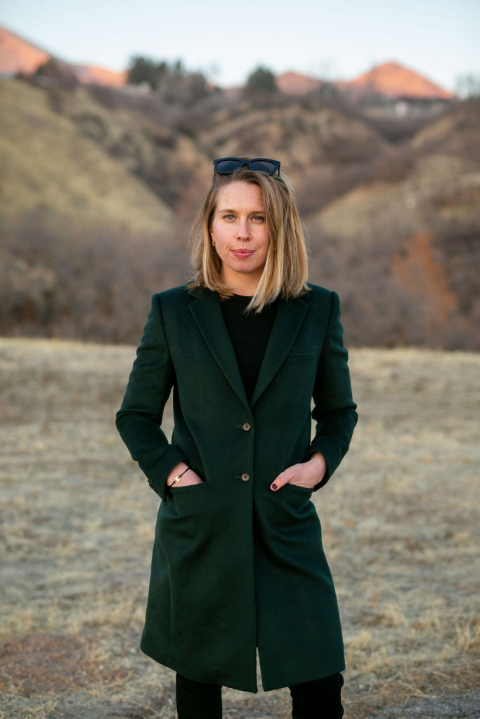 woman wearing Joseph Green Wool Coat and standing outdoors for resale sites