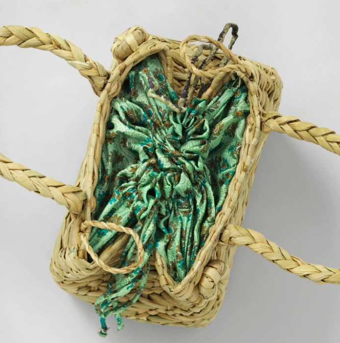 top view of the MEHROTRA straw bag